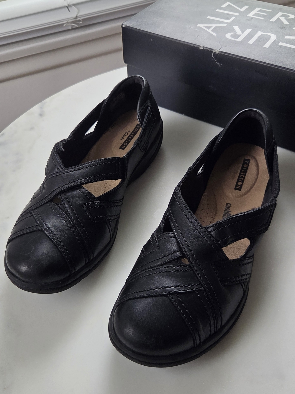Clarks Black Leather Slip-On Crossover Flats